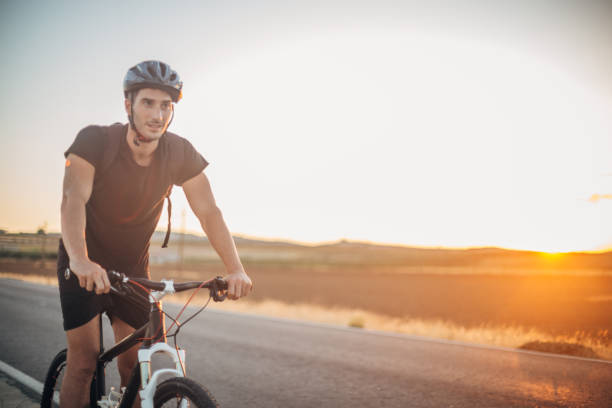 istock Young man riding a bike 1191725738