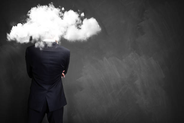 istock businessman with his head in a cloud 1191725870