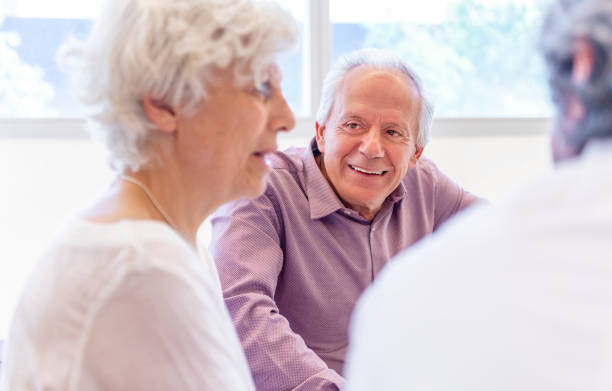 istock Doctor talks with a senior couple 1191726800