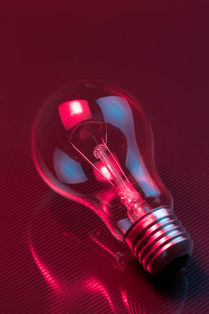 istock Photo of light bulb lamp in neon light. Ideea concept. 1191727151
