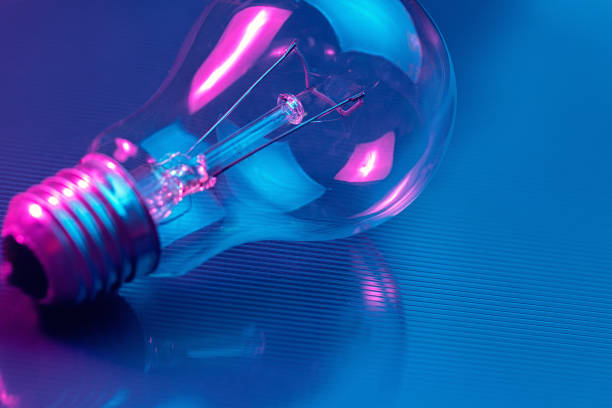 istock Photo of light bulb lamp in neon light. Ideea concept. 1191727168