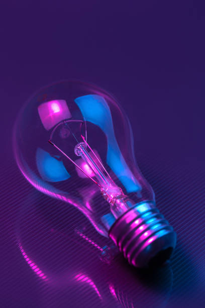 istock Photo of light bulb lamp in neon light. Ideea concept. 1191727177
