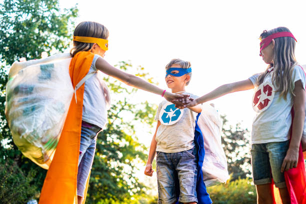 istock Children taking care about a nature 1191727415