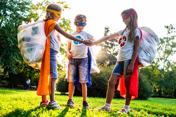 istock Children making recycling agreement 1191727576