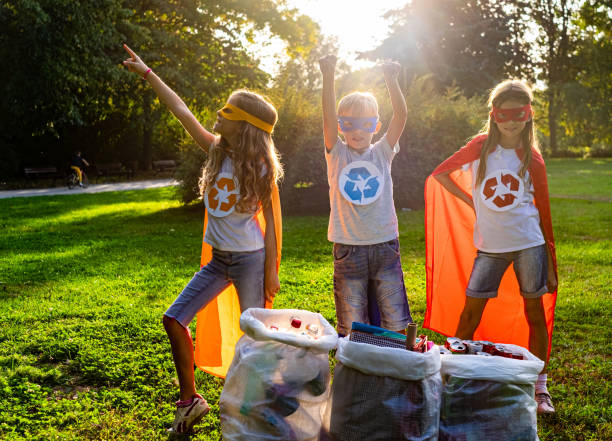 istock Recycling hero kids in nature 1191728229