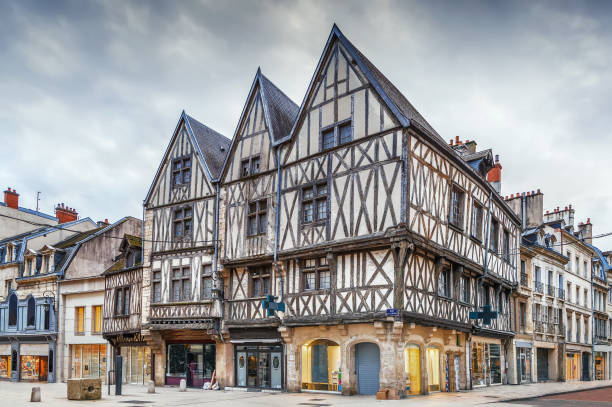 Street in Dijon, France Street with historical half-timbered houses in Dijon, France dijon stock pictures, royalty-free photos & images