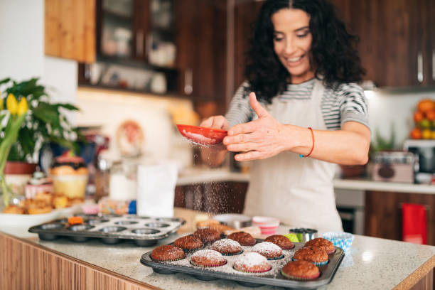 Confectioner decorating Chocolate Muffins