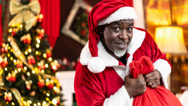 istock Santa Claus Delivering Gifts 1191730331