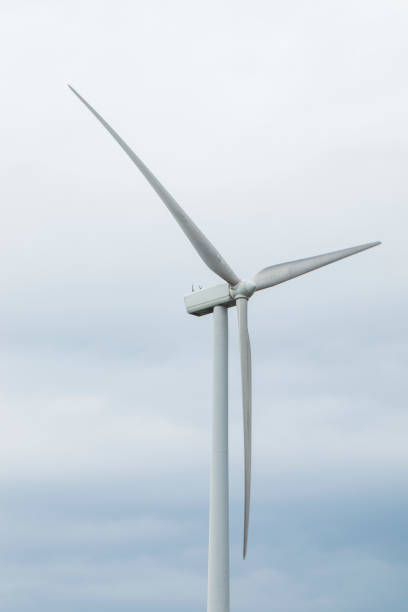 istock Wind turbines in an open field. 1191731707