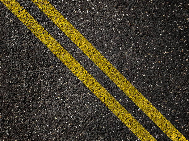 istock Asphalt road with double yellow lines 1191734161