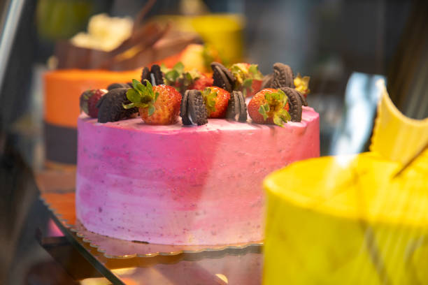 istock Pink birthday cake with strawberries. 1191736744