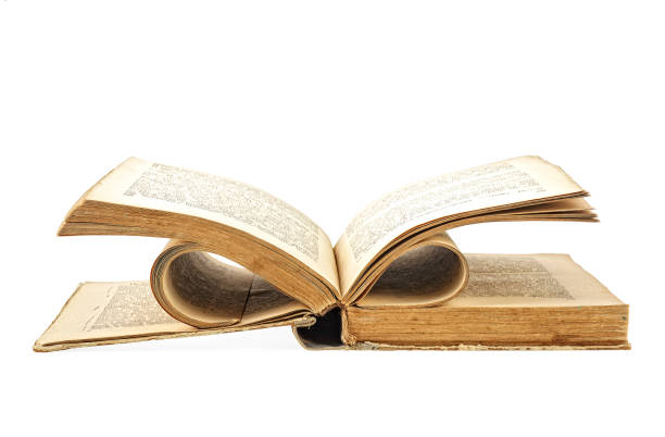 istock Open hardcover old book isolated on a white background 1191739025