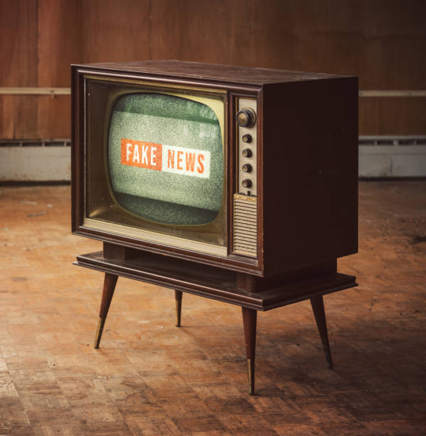 Vintage Fake News Vintage television with Fake News. fake news stock pictures, royalty-free photos & images