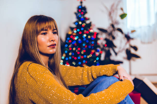 istock Woman feeling sad and alone on Christmas 1191740410