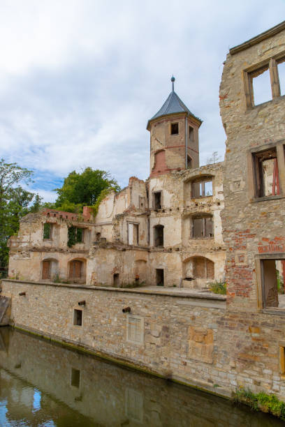 istock Schloss Harbke ,ruined castle with lake 1191740508