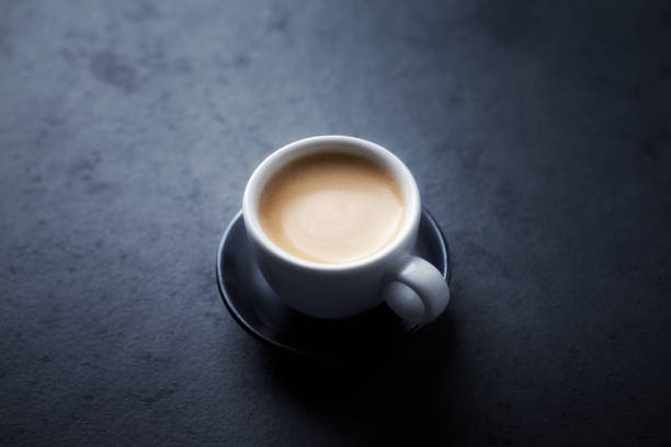 istock Cup of coffee on black background. Copy space. 1191741945