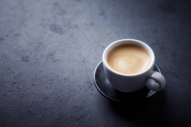 istock Cup of coffee on black background. Copy space. 1191748878