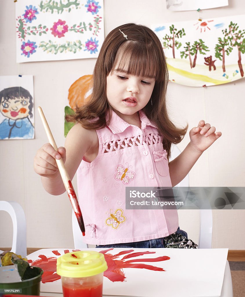 Child preschooler painting.  Activity Stock Photo