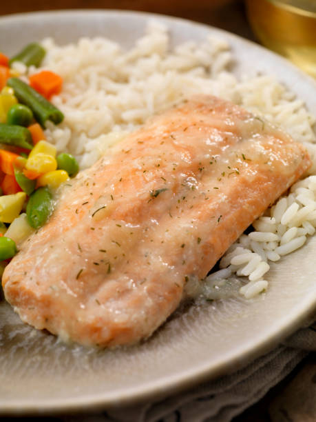 istock Salmon Fillet with a Lemon Dill Sauce, Rice and Mixed Vegetables 1191754075