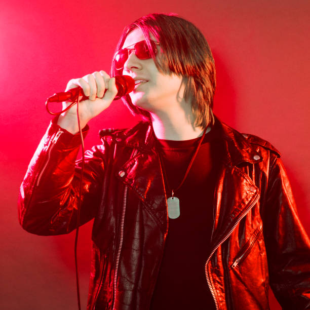 istock rock musician on red background 1191757298