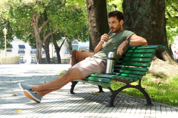 istock young man relaxed in a park 1191759854