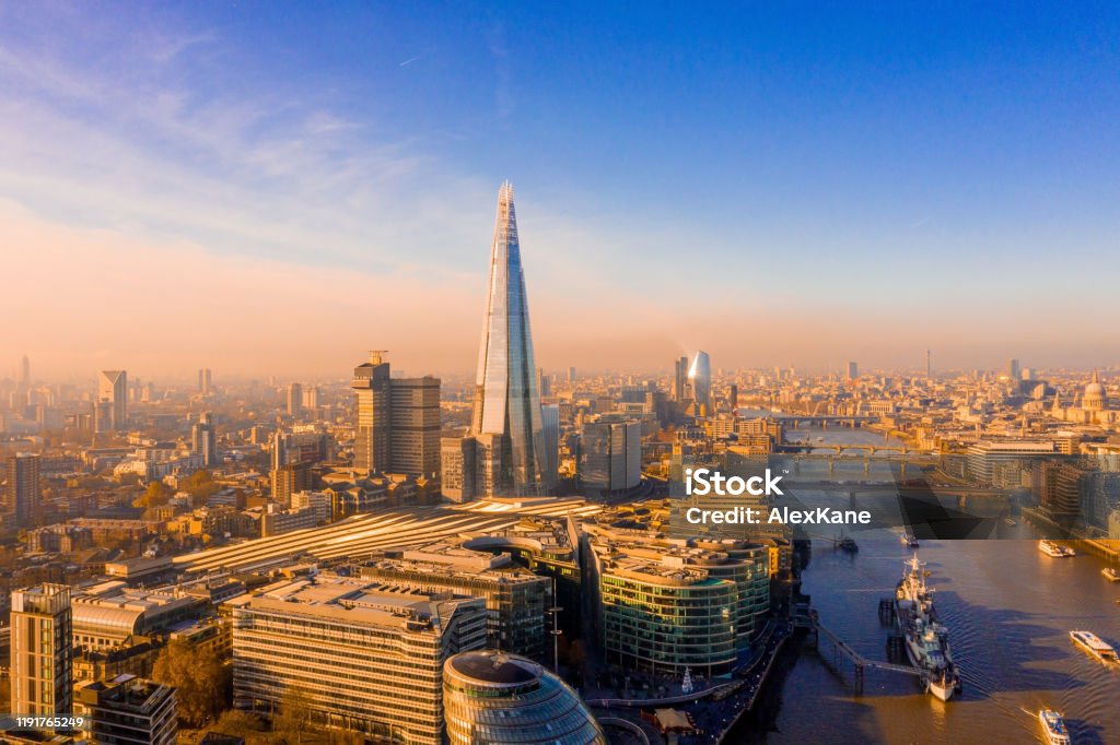 Stunning panorama view over Thames river, the Shard Stunning panorama view over Thames river, the Shard, the London skyline and cityscape from the skyscraper. Aerial photo over the big city. Shard London Bridge Stock Photo