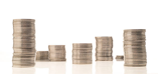 istock stack of coins isolated on white background incomes are rising 1191765290