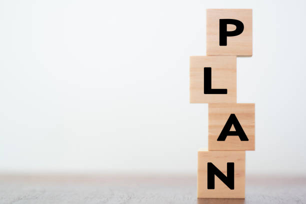 istock Plan wriiten on wooden cubes with copy space 1191765436