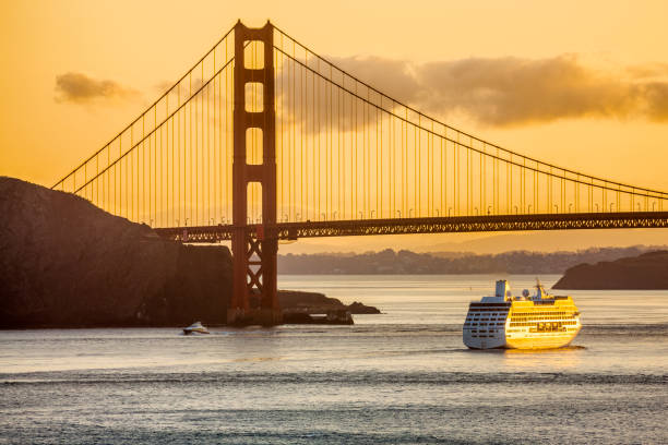 San Francisco Bay area in California on May 12, 2011: The Golden Gate Bridge and Bay area in San Francisco California at dawn with cruise ship