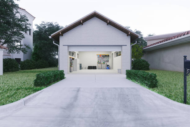 Open Garage With Concrete Driveway Open door of a modern garage with a concrete driveway at the urban district. open stock pictures, royalty-free photos & images