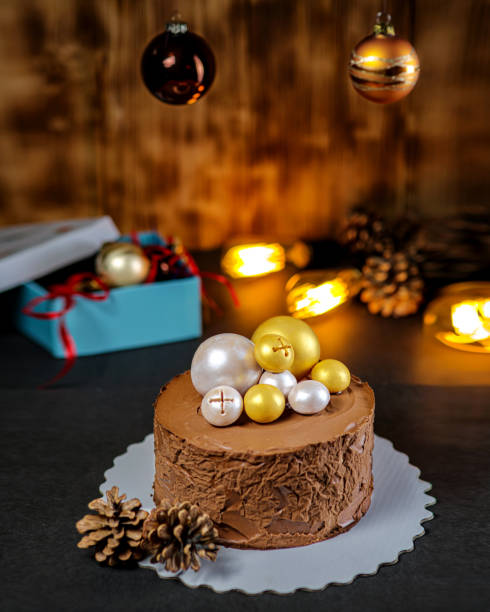 istock Christmas Chocolate Cake on wooden background 1191782568