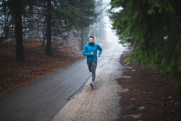 istock Man Running On The Road. 1191782627