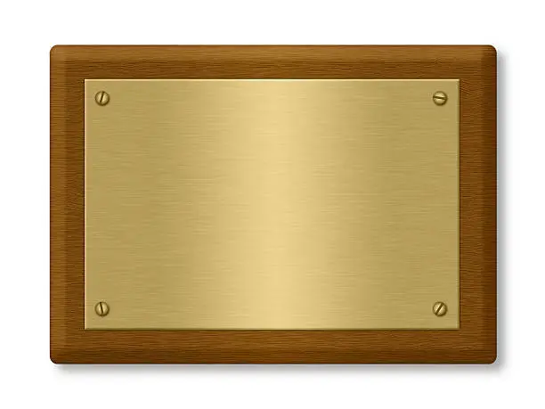 Plaque or sign consisting of a gold plate on wood. Isolated on White. Clipping path included.