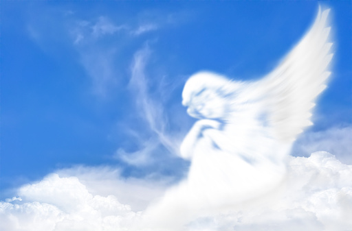 Angel sitting on the clouds with blue sky background