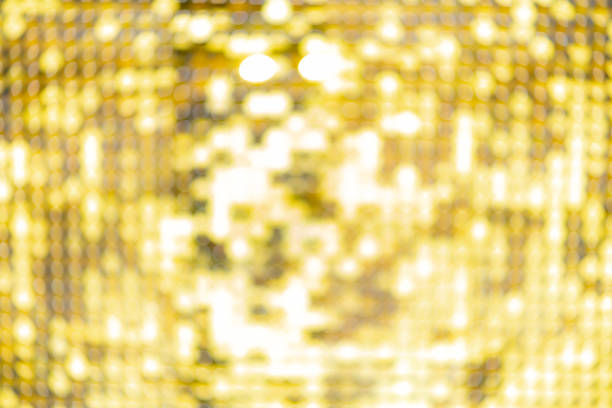 Abstract blur sequin dress colorful bokeh goldren light. Design backdrop. Disco color