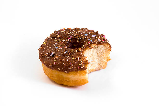 istock doughnut with bite taken out over white 119178693