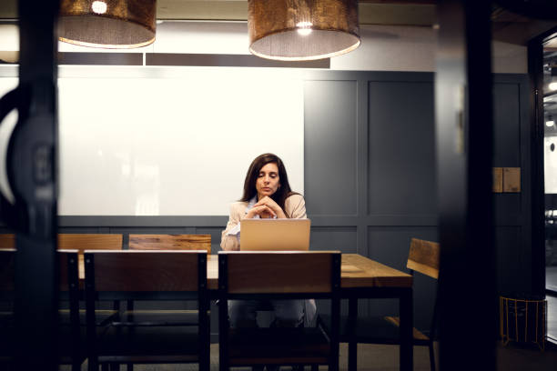 Woman working late at the office
