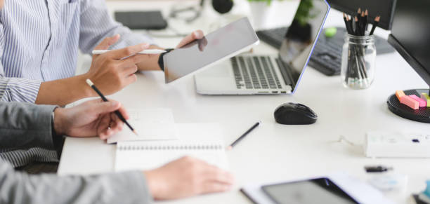 istock Cropped shot of professional architect and engineer working on their project 1191790558