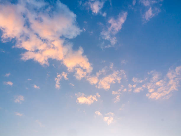 istock Beautiful golden clouds on sunset sky background. 1191796362