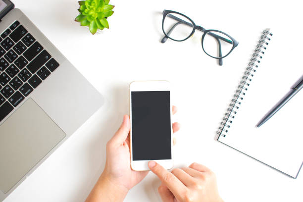 istock Asian hands are using smartphones 1191800294
