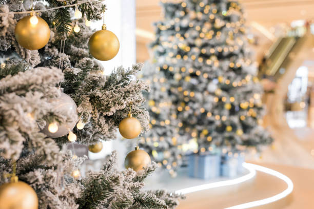 istock Christmas trees decorated by Christmas balls and lights 1191803549