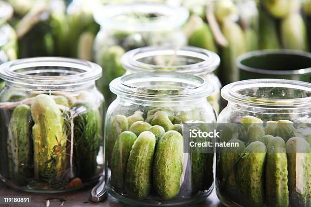 An Imagine Of Cucumbers In Jars Ready To Be Pickled Stock Photo - Download Image Now