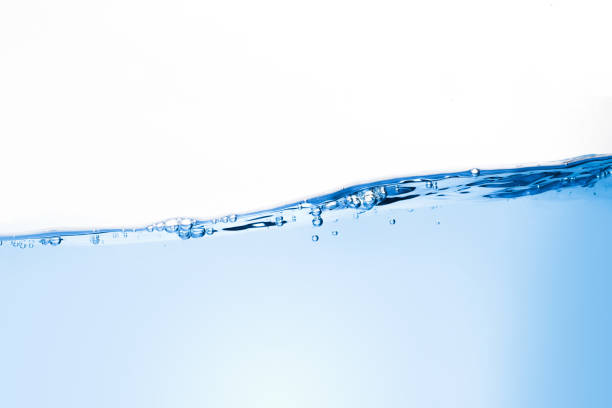 istock Close-up, blue water waves and bubbles in the side view. Graphic Design. 1191809306