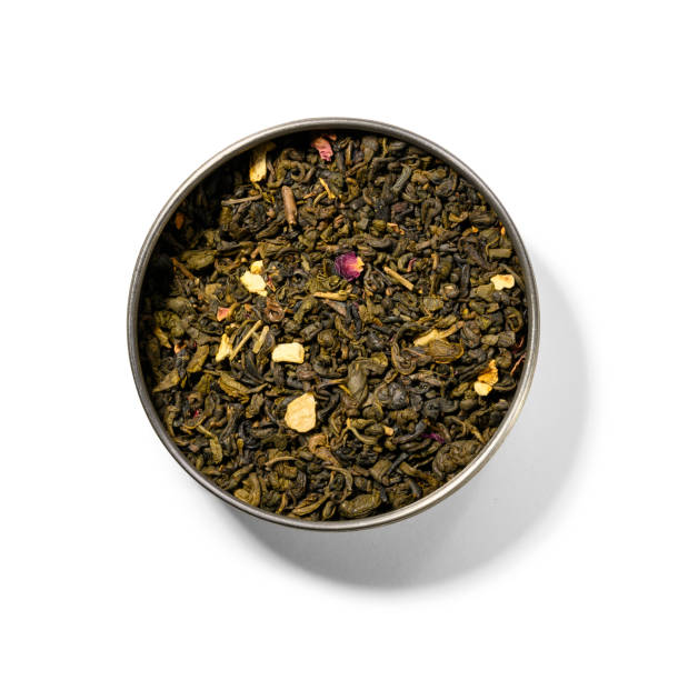 istock Green tea with aromatic additives. Top view on white background 1191809335