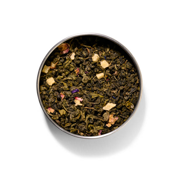 istock Green tea with aromatic additives. Top view on white background 1191810482