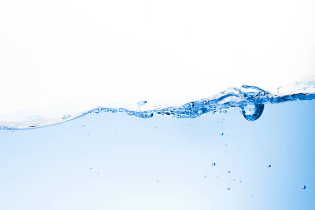 istock Blue water waves and bubbles in drinking water. Isolated background. 1191812083
