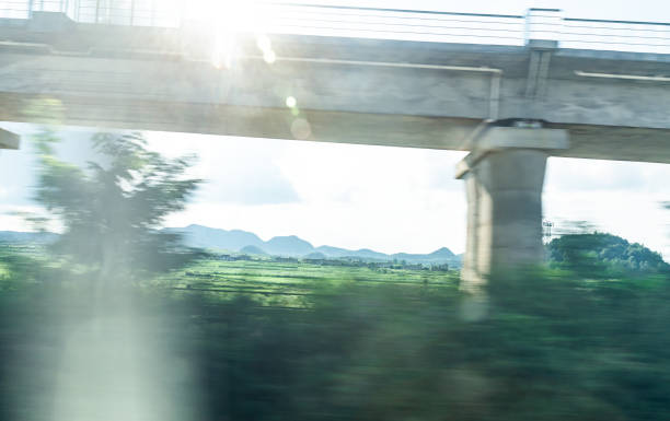 istock Elevated road viewed from high speed train in Guilin, China 1191812724
