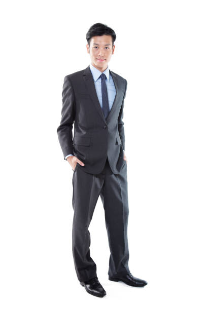 istock Confident Asian Businessman Hands in Pockets on White Background 1191813885