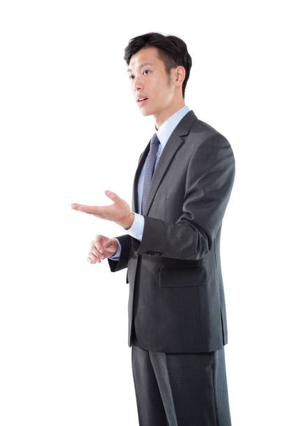 istock Handsome Asian Businessman in Conversation on White Background 1191814461