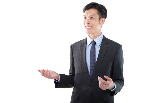 istock Handsome Asian Businessman Talking with Confident on White Background 1191814575